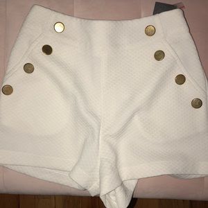 High waisted White shorts w/ gold buttons